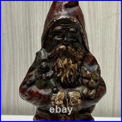 ANTIOUE CAST IRON SANTA CLAUS DOOR STOP FIGURE DATED 1890 5 1/2 Paper weight