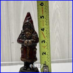 ANTIOUE CAST IRON SANTA CLAUS DOOR STOP FIGURE DATED 1890 5 1/2 Paper weight