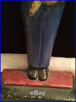 ANTIQUE CAST IRON DOORSTOP THE MESSENGER BY HUBLEY DESIGNED BY FISH