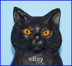 ANTIQUE CAT KITTEN ON OVAL BASE With GLASS EYES CAST IRON DOORSTOP METAL ART 1920s