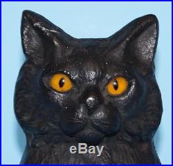 ANTIQUE CAT KITTEN ON OVAL BASE With GLASS EYES CAST IRON DOORSTOP METAL ART 1920s