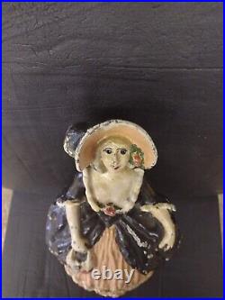 ANTIQUE COLONIAL LADY HOLDING PURSE CAST IRON DOORSTOP Ca. 1920's AMERICANA