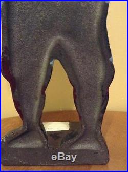 ANTIQUE EARLY 20th CENTURY CAST IRON BASEBALL PLAYER DOORSTOP O. C. F. DATED 1912