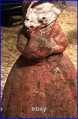 ANTIQUE FIGURAL CAST IRON DOORSTOP WOMAN HOLDING FLOWERS Original Paint