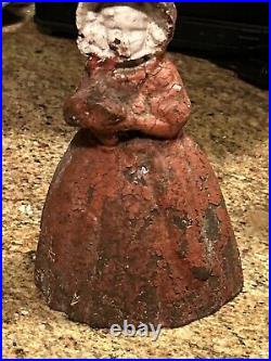 ANTIQUE FIGURAL CAST IRON DOORSTOP WOMAN HOLDING FLOWERS Original Paint