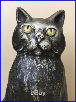 ANTQ. 1920s BLACK CAT, GREEN EYES, CURLED TAIL SITTING ON WEDGE IRON DOORSTOP