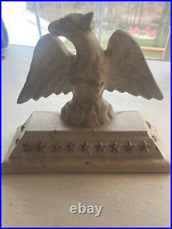 Anitique Eagle cast iron Door Stop cream and gold stars