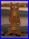 Antique_1920_Cast_Iron_Figure_Feline_Cat_Door_Stop_With_Blue_Crystal_Glass_Eyes_01_ldsy