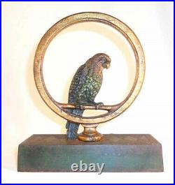 Antique Bradley and Hubbard Painted Cast Iron Doorstop Parrot/Parakeet in Ring