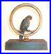Antique_Bradley_and_Hubbard_Painted_Cast_Iron_Doorstop_Parrot_Parakeet_in_Ring_01_bmhf