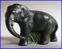 Antique CJO Judd Co. DOORSTOP ELEPHANT in Grass