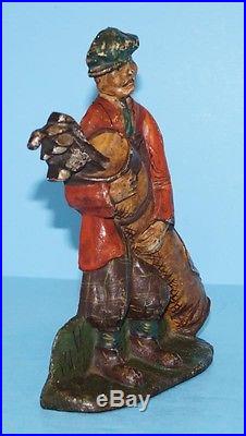 Antique Caddy with Golf Bag Cast Iron Metal Art Figural Doorstop Golf