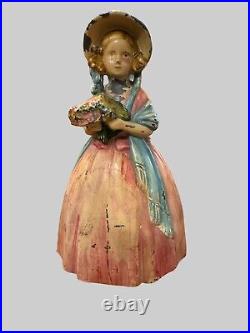 Antique Cast Iron Doorstop Colonial Woman with Flowers