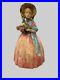 Antique_Cast_Iron_Doorstop_Colonial_Woman_with_Flowers_01_wm