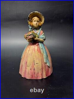 Antique Cast Iron Doorstop Colonial Woman with Flowers