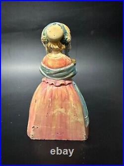 Antique Cast Iron Doorstop Colonial Woman with Flowers