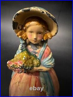 Antique Cast Iron Doorstop Colonial Woman with Flowers