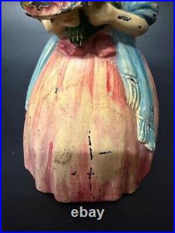 Antique Cast Iron Doorstop Colonial Woman with Flowers