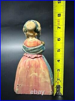 Antique Cast Iron Doorstop Colonial Woman with Flowers