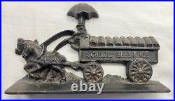 Antique Cast Iron Doorstop SCHULTZ BEER & ALE Wagon