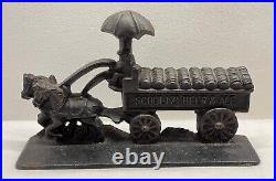 Antique Cast Iron Doorstop SCHULTZ BEER & ALE Wagon