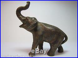 Antique Cast Iron Elephant figural paperweight mini doorstop orig old gold paint