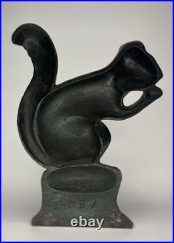 Antique Cast Iron Squirrel Door Stop Eating A Nut Sitting On A Stump