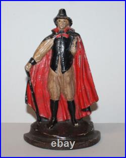 Antique Cast Iron Victorian Door Stop of Man with Cape Holding Book and Cane