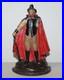 Antique_Cast_Iron_Victorian_Door_Stop_of_Man_with_Cape_Holding_Book_and_Cane_01_pxqg