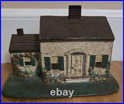 Antique Door Stop Heavy Cast Iron Cape style house 4 inches high by 7-1/4 wide