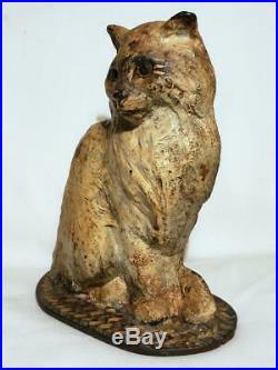 Antique National Foundry Cast Iron Figural Doorstop Sitting Cat On Braided Rug