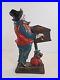 Antique_Organ_Grinder_Monkey_Cast_Iron_Figural_Door_Stop_Decorative_Art_Statue_01_yr
