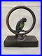 Antique_Original_Bradley_Hubbard_Cast_Iron_Art_Deco_Parrot_In_Ring_Door_Stop_01_ye