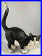 Antique_Painted_12_Heavy_Cast_Iron_Black_White_Arched_Cat_Door_Stop_Hubley_01_xy