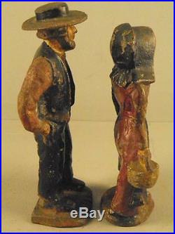 Antique Painted Cast Iron Figural Pair Doorstops Amish Man & Amish Lady