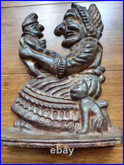 Antique Punch and Judy Cast Iron Door Stop