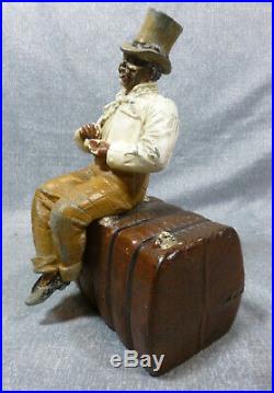 Antique & Rare Judd Co. #1248 Man on Bale of Cotton Cast iron Doorstop