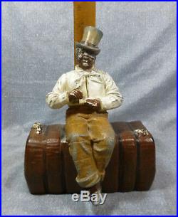 Antique & Rare Judd Co. #1248 Man on Bale of Cotton Cast iron Doorstop