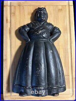 Antique/Vintage (1920s-30s)Figural Lady Cast-Iron Doorstop. Painted Black