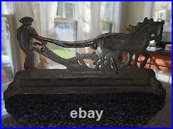Antique cast Iron Horse and Plow Door stop countertop