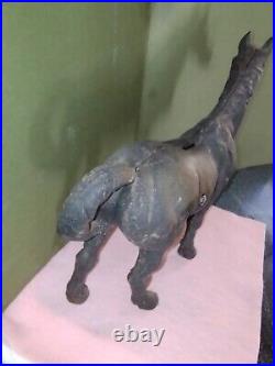 Antique cast iron horse bank or door stop, 10'' tall & 11'' long. A country look
