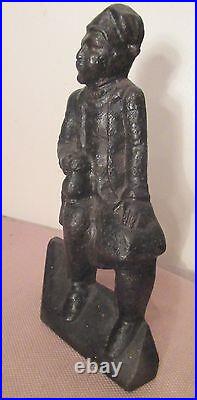 Antique heavy 1800's cast iron figural drinking man with stein ale house doorstop