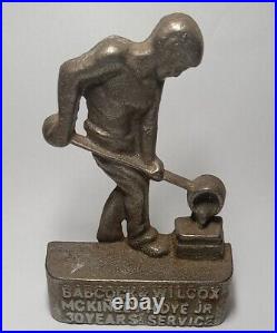 Cast Iron Foundry Worker Babcock & Wilcox Doorstop Figure