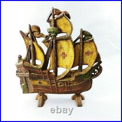 Doorstop Cast Iron Galleon Ship Painted with Red Cross on Sails
