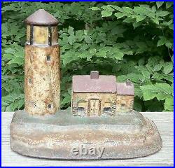 Genuine Antique Cast Iron Doorstop Lighthouse and Keepers Cottage