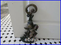 Gorgeous Vintage or Antique Heavy Iron Door Stop Scrolly Cherub with Fruit