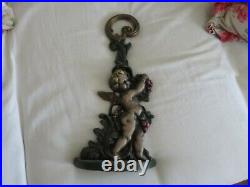 Gorgeous Vintage or Antique Heavy Iron Door Stop Scrolly Cherub with Fruit