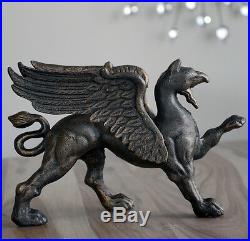 Griffin Statue Sculpture Made of Iron can be used as doorstop or bookend too