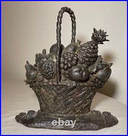 Huge antique original cast iron flower basket bouquet heavy figural doorstop Huge antique original cast iron flower basket bouquet heavy figural doorstop