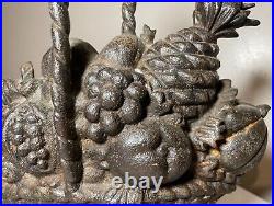 Huge antique original cast iron flower basket bouquet heavy figural doorstop Huge antique original cast iron flower basket bouquet heavy figural doorstop
